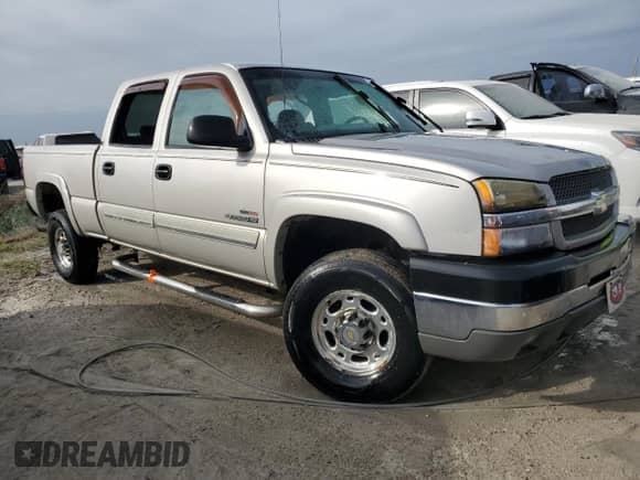 2004 Chevrolet Silverado 2500HD LS с VIN 1GCHC23204F198312, выставлен на аукционе Copart как лот 75408514 с пробегом Не указан миль и На запчасти • Non repairable. История ставок и продаж доступна на DreamBid. Изображение 4.