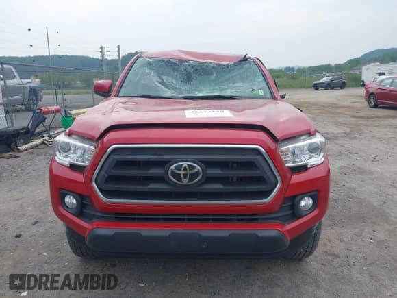 2021 Toyota Tacoma SR5 z VIN 3TYDZ5BN1MT002232, wystawiony jako IAAI lot #42374170 z przebiegiem 16 465 mil mil oraz . Historia ofert i sprzedaży dostępna na DreamBid. Obrazek 12.