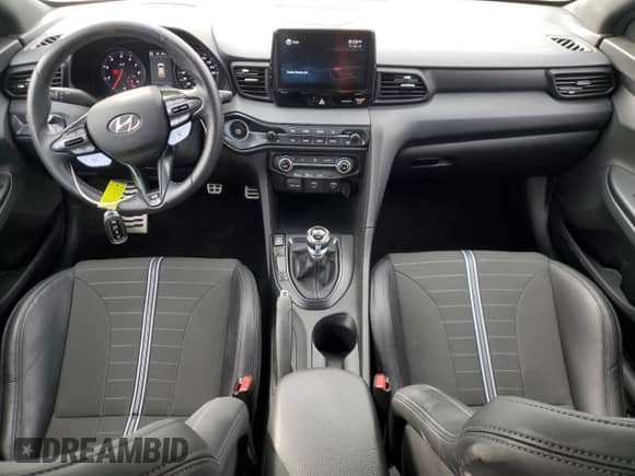 2022 Hyundai Veloster z VIN KMHT36AH1NU013346, wystawiony jako Copart lot #54510735 z przebiegiem 50 303 mil mil oraz Szkoda całkowita • Salvage title. Historia ofert i sprzedaży dostępna na DreamBid. Obrazek 8.