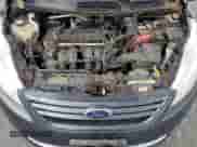 2011 Ford Fiesta S z VIN 3FADP4AJ2BM169616, wystawiony jako Copart lot #70897735 z przebiegiem 196 993 mil mil oraz Czysty tytuł • Clean title. Historia ofert i sprzedaży dostępna na DreamBid. Obrazek 11.