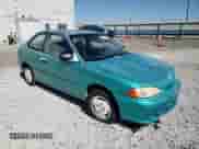 1995 Hyundai Accent z VIN KMHVD14N1SU015961, wystawiony jako Copart lot #72066404 z przebiegiem 118 163 mil mil oraz Szkoda całkowita • Salvage title. Historia ofert i sprzedaży dostępna na DreamBid. Obrazek 10.