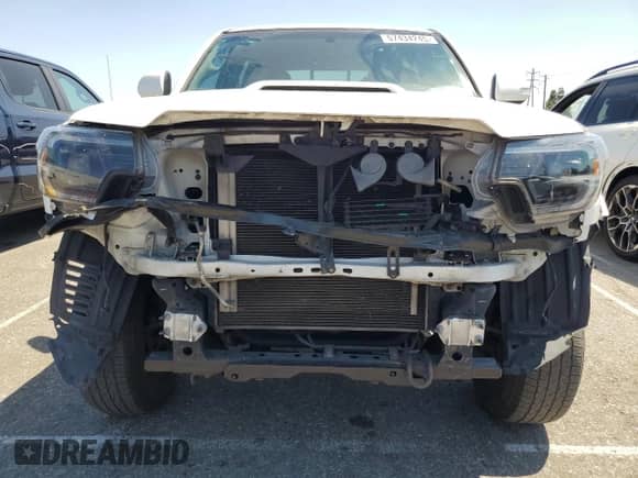 2014 Toyota Tacoma PreRunner z VIN 3TMKU4HN3EM038766, wystawiony jako Copart lot #57434245 z przebiegiem 176 882 mil mil oraz Szkoda całkowita • Salvage title. Historia ofert i sprzedaży dostępna na DreamBid. Obrazek 5.