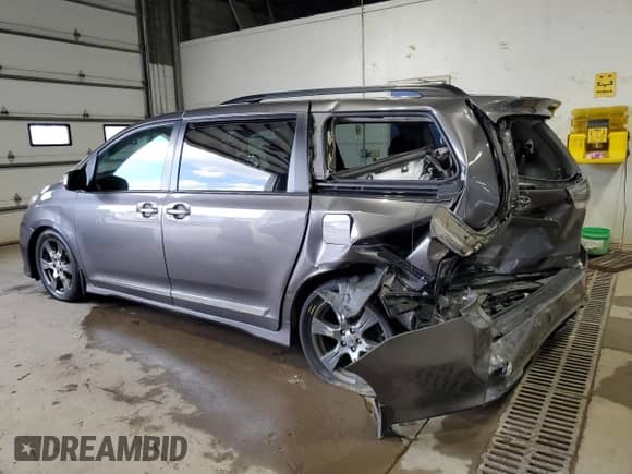 2017 Toyota Sienna SE with VIN 5TDXZ3DC7HS825200, listed as a Copart auction lot 70044905 with 221,114 mi miles and Salvage title. Bid and sale history available at DreamBid. Image 2.