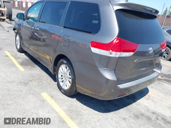 2012 Toyota Sienna XLE AAS with VIN 5TDYK3DC2CS229316, listed as a IAAI auction lot 42888316 with 167,220 mi miles and . Bid and sale history available at DreamBid. Image 3.