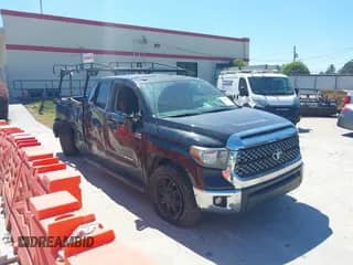 2014 Toyota Tundra SR z VIN 5TFUW5F17EX348129, wystawiony jako IAAI lot #43086591 z przebiegiem 180 905 mil mil oraz . Historia ofert i sprzedaży dostępna na DreamBid. Obrazek 1.