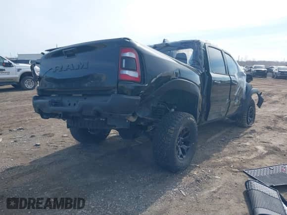 2024 Ram 1500 TRX with VIN 1C6SRFU95RN113699, listed as a IAAI auction lot 41554126 with 3,750 mi miles and . Bid and sale history available at DreamBid. Image 4.