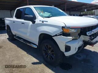 2020 Chevrolet Silverado 1500 Custom z VIN 1GCUYBEF1LZ124152, wystawiony jako IAAI lot #42258444 z przebiegiem 75 565 mil mil oraz . Historia ofert i sprzedaży dostępna na DreamBid. Obrazek 1.