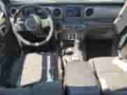 2022 Jeep Wrangler Unlimited Sport S with VIN 1C4HJXDG6NW195431, listed as a Copart auction lot 65503225 with 7,588 mi miles and Salvage title. Bid and sale history available at DreamBid. Image 8.