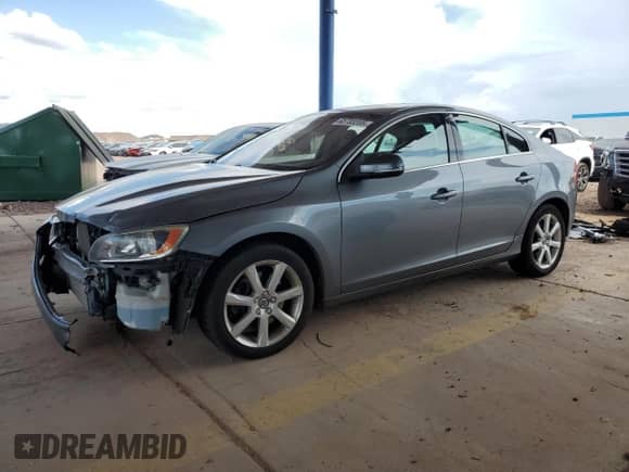2016 Volvo S60 T5 Premier with VIN YV1612TK1G2394424, listed as a Copart auction lot 65703205 with 105,423 mi miles and Salvage title. Bid and sale history available at DreamBid. Image 1.