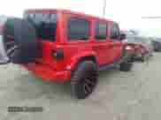 2022 Jeep Wrangler Unlimited Sahara with VIN 1C4JJXP62NW136932, listed as a IAAI auction lot 41486025 with 36,986 mi miles and . Bid and sale history available at DreamBid. Image 4.