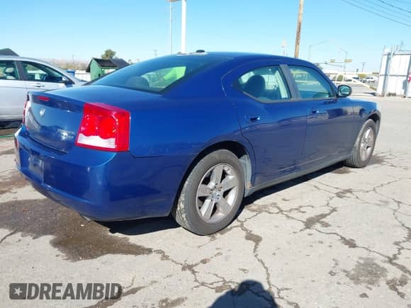 2009 Dodge Charger SXT с VIN 2B3KA33V59H513091, выставлен на аукционе IAAI как лот 43502851 с пробегом 214 308 миль миль и . История ставок и продаж доступна на DreamBid. Изображение 4.