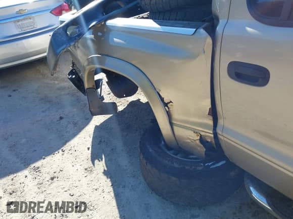 2003 Dodge Dakota with VIN 1D7HG48X53S378899, listed as a IAAI auction lot 42981132 with Not provided miles and . Bid and sale history available at DreamBid. Image 6.