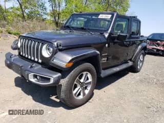 2021 Jeep Wrangler Unlimited Sahara with VIN 1C4HJXEN6MW609397, listed as a Copart auction lot 62983915 with 42,601 mi miles and Salvage title. Bid and sale history available at DreamBid. Image 1.