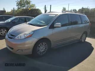 2009 Toyota Sienna XLE with VIN 5TDZK22C19S262401, listed as a Copart auction lot 82670145 with 331,151 mi miles and Clean title. Bid and sale history available at DreamBid. Image 1.