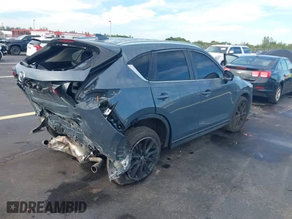 2022 Mazda CX-5 S Preferred z VIN JM3KFBCM3N0539261, wystawiony jako IAAI lot #43264779 z przebiegiem 60 847 mil mil oraz . Historia ofert i sprzedaży dostępna na DreamBid. Obrazek 4.