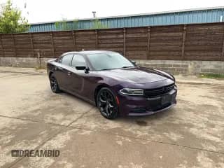 2020 Dodge Charger SXT with VIN 2C3CDXBG6LH234409, listed as a Copart auction lot 89438715 with 123,582 mi miles and Clean title. Bid and sale history available at DreamBid. Image 1.