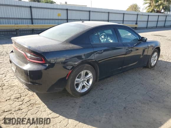 2022 Dodge Charger SXT with VIN 2C3CDXBG2NH152342, listed as a Copart auction lot 82077145 with 62,399 mi miles and Clean title. Bid and sale history available at DreamBid. Image 3.