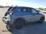 2023 Mazda CX-5 S Carbon Edition z VIN JM3KFBCM5P0219202, wystawiony jako Copart lot #81634365 z przebiegiem 24 429 mil mil oraz Szkoda całkowita • Salvage title. Historia ofert i sprzedaży dostępna na DreamBid. Obrazek 3.