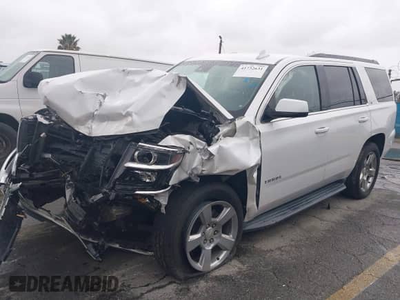 2018 Chevrolet Tahoe LT z VIN 1GNSKBKC7JR351112, wystawiony jako IAAI lot #41732631 z przebiegiem 103 771 mil mil oraz . Historia ofert i sprzedaży dostępna na DreamBid. Obrazek 2.