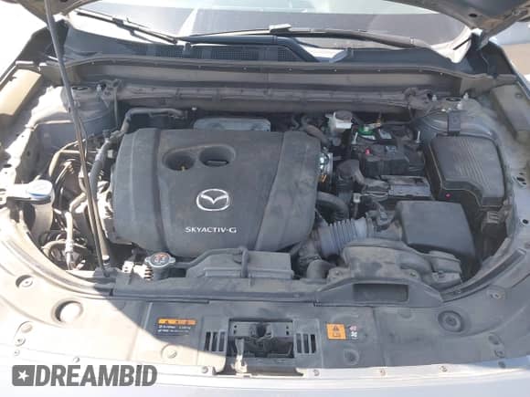 2022 Mazda CX-5 S Preferred with VIN JM3KFBCM9N0529494, listed as a IAAI auction lot 43179890 with 57,495 mi miles and . Bid and sale history available at DreamBid. Image 10.