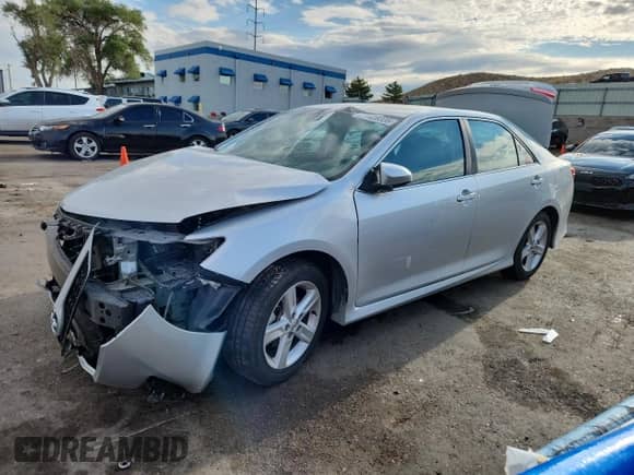 2014 Toyota Camry LE with VIN 4T1BF1FK1EU405365, listed as a Copart auction lot 71428335 with 116,116 mi miles and Salvage title. Bid and sale history available at DreamBid. Image 1.