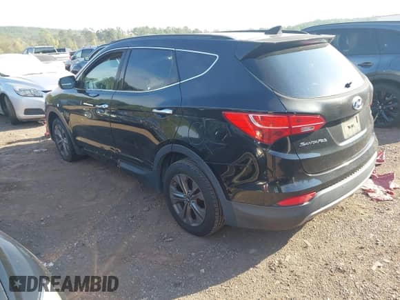 2014 Hyundai Santa Fe with VIN 5XYZU3LB5EG179194, listed as a IAAI auction lot 43249117 with 164,045 mi miles and . Bid and sale history available at DreamBid. Image 3.