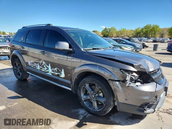 2018 Dodge Journey Crossroad with VIN 3C4PDDGG4JT387993, listed as a Copart auction lot 82166675 with 151,631 mi miles and Salvage title. Bid and sale history available at DreamBid. Image 4.