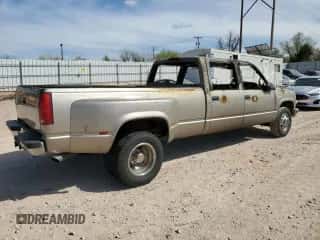 1999 Chevrolet Silverado 3500 с VIN 1GCHC33J2XF038028, выставлен на аукционе Copart как лот 50646935 с пробегом Не указан миль и На запчасти • Non repairable. История ставок и продаж доступна на DreamBid. Изображение 3.