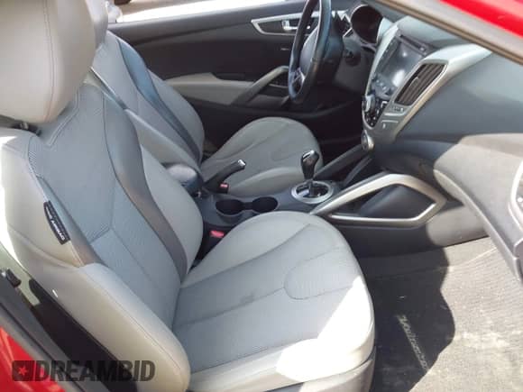 2012 Hyundai Veloster w/Black Int с VIN KMHTC6AD4CU077164, выставлен на аукционе IAAI как лот 42053970 с пробегом 122 657 миль миль и . История ставок и продаж доступна на DreamBid. Изображение 5.