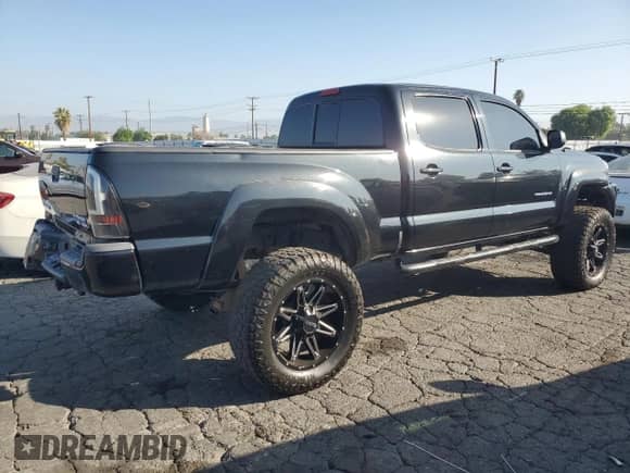 2007 Toyota Tacoma PreRunner with VIN 3TMKU72N37M011242, listed as a Copart auction lot 80303705 with 189,591 mi miles and Non repairable. Bid and sale history available at DreamBid. Image 3.