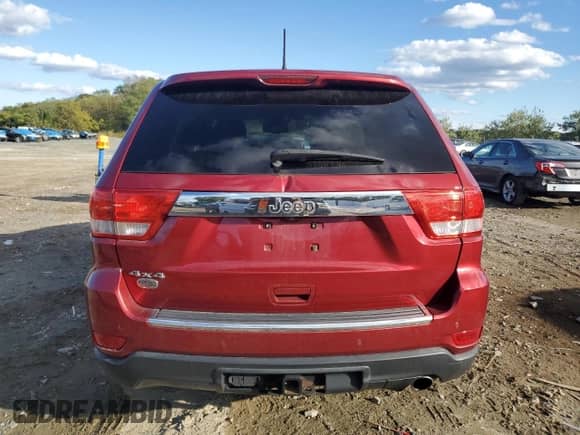 2012 Jeep Grand Cherokee Overland z VIN 1C4RJFCG6CC264603, wystawiony jako Copart lot #85195365 z przebiegiem 158 012 mil mil oraz Szkoda całkowita • Salvage title. Historia ofert i sprzedaży dostępna na DreamBid. Obrazek 6.