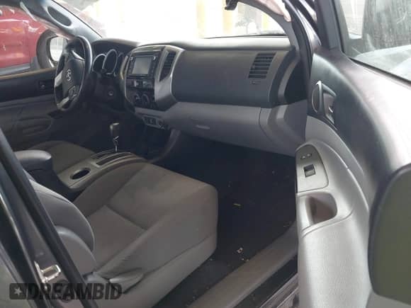 2014 Toyota Tacoma PreRunner with VIN 3TMKU4HN9EM042319, listed as a IAAI auction lot 43450085 with 89,135 mi miles and . Bid and sale history available at DreamBid. Image 5.