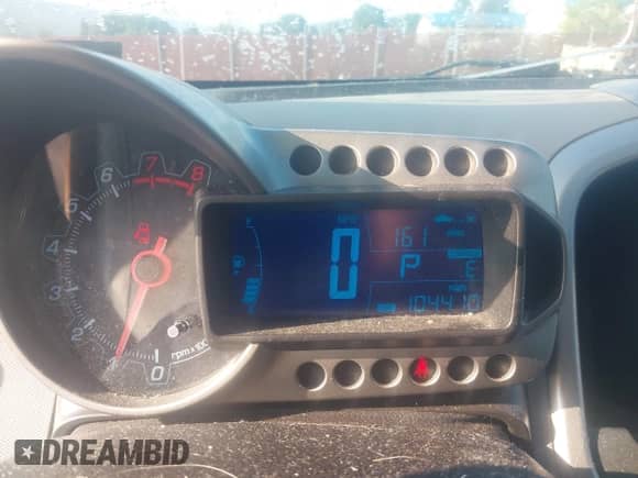 2014 Chevrolet Sonic LTZ with VIN 1G1JE6SB3E4200225, listed as a IAAI auction lot 42840609 with 104,410 mi miles and . Bid and sale history available at DreamBid. Image 7.