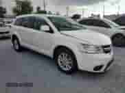 2015 Dodge Journey SXT with VIN 3C4PDCBBXFT595146, listed as a Copart auction lot 68080395 with 205,925 mi miles and Salvage title. Bid and sale history available at DreamBid. Image 4.