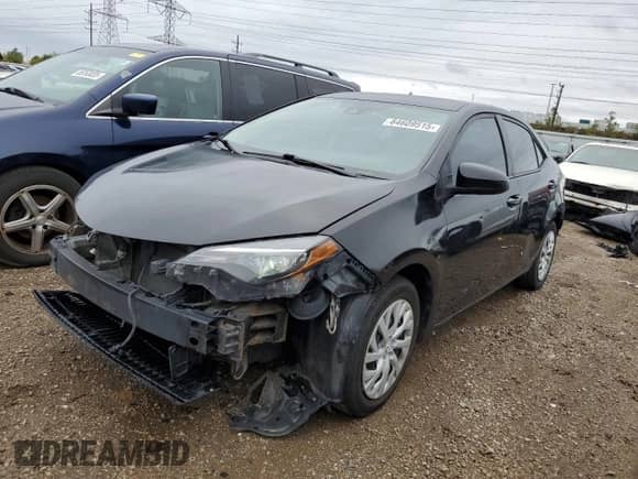 2019 Toyota Corolla L with VIN 5YFBURHE6KP877974, listed as a Copart auction lot 84609515 with 63,485 mi miles and Salvage title. Bid and sale history available at DreamBid. Image 1.