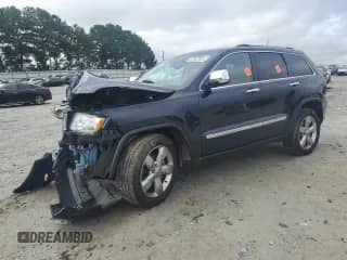 2012 Jeep Grand Cherokee Overland with VIN 1C4RJECG2CC299407, listed as a Copart auction lot 67927825 with Not provided miles and Salvage title. Bid and sale history available at DreamBid. Image 1.