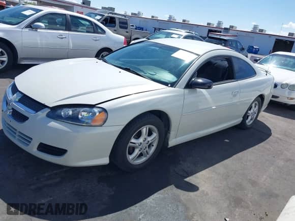 2003 Dodge Stratus SE z VIN 4B3AG42G93E196528, wystawiony jako IAAI lot #41941304 z przebiegiem 191 930 mil mil oraz . Historia ofert i sprzedaży dostępna na DreamBid. Obrazek 13.