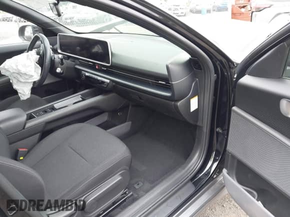 2024 Hyundai Ioniq 6 SE with VIN KMHM24AC9RA067002, listed as a IAAI auction lot 43215683 with 16,310 mi miles and . Bid and sale history available at DreamBid. Image 5.