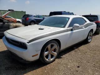 2013 Dodge Challenger R/T z VIN 2C3CDYBT4DH501146, wystawiony jako Copart lot #64804985 z przebiegiem 159 352 mil mil oraz Czysty tytuł • Clean title. Historia ofert i sprzedaży dostępna na DreamBid. Obrazek 1.