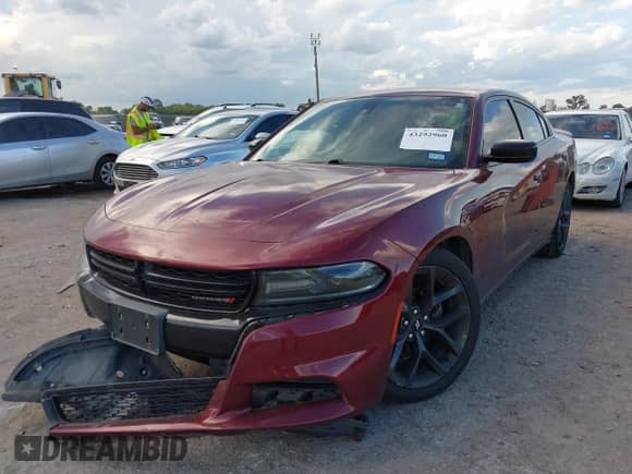 2019 Dodge Charger SXT with VIN 2C3CDXBG1KH732497, listed as a IAAI auction lot 43292960 with 127,248 mi miles and . Bid and sale history available at DreamBid. Image 2.