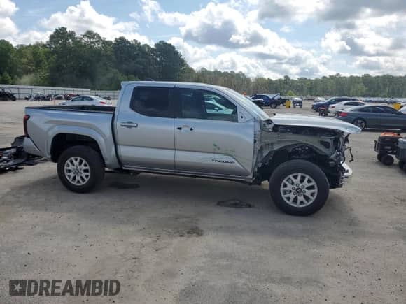 2024 Toyota Tacoma SR5 with VIN 3TMKB5FN1RM023512, listed as a Copart auction lot 68438505 with 5,994 mi miles and Salvage title. Bid and sale history available at DreamBid. Image 4.