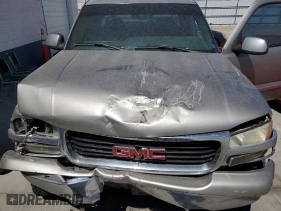 2001 GMC Sierra 1500 SLE с VIN 2GTEK19T711191747, выставлен на аукционе Copart как лот 69829495 с пробегом Не указан миль и Списание • Salvage title. История ставок и продаж доступна на DreamBid. Изображение 11.