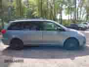 2010 Toyota Sienna CE z VIN 5TDKK4CC2AS327868, wystawiony jako IAAI lot #43291981 z przebiegiem 149 532 mil mil oraz . Historia ofert i sprzedaży dostępna na DreamBid. Obrazek 13.