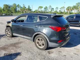 2017 Hyundai Santa Fe 2.4L with VIN 5NMZU3LB8HH012323, listed as a IAAI auction lot 43436599 with 48,656 mi miles and . Bid and sale history available at DreamBid. Image 3.