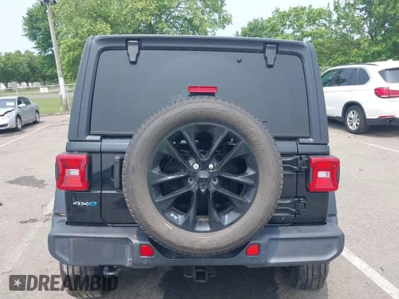 2021 Jeep Wrangler Unlimited Sahara with VIN 1C4JJXP60MW772389, listed as a IAAI auction lot 42486121 with Not provided miles and . Bid and sale history available at DreamBid. Image 16.