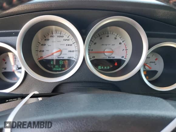 2006 Dodge Charger SRT-8 with VIN 2B3KA73W86H369838, listed as a Copart auction lot 52767384 with 165,630 mi miles and Salvage title. Bid and sale history available at DreamBid. Image 9.