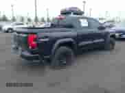 2024 Chevrolet Colorado 4WD Trail Boss with VIN 1GCPTEEK1R1130034, listed as a IAAI auction lot 42404431 with 8,664 mi miles and . Bid and sale history available at DreamBid. Image 4.