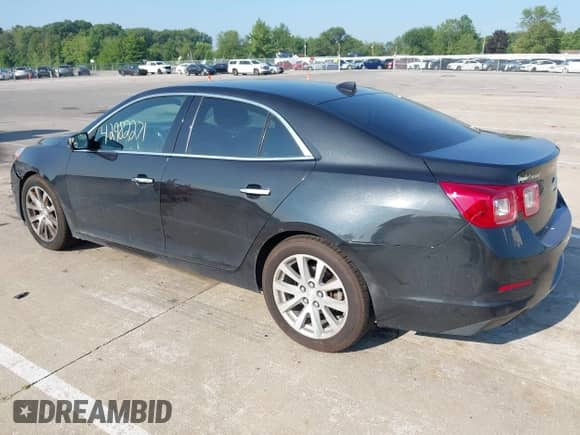 2014 Chevrolet Malibu LTZ with VIN 1G11H5SL2EF160573, listed as a IAAI auction lot 42982271 with 269,496 mi miles and . Bid and sale history available at DreamBid. Image 3.
