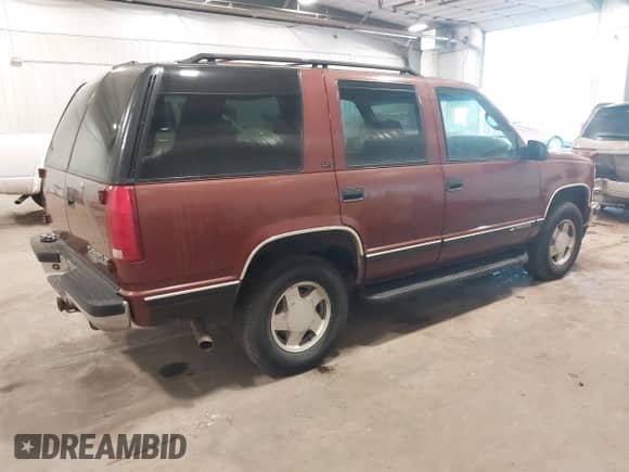 1998 Chevrolet Tahoe with VIN 1GNEK13RXWJ330934, listed as a IAAI auction lot 41431736 with 269,137 mi miles and . Bid and sale history available at DreamBid. Image 4.