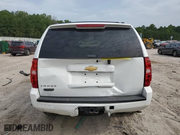 2013 Chevrolet Tahoe LS with VIN 1GNSKAE03DR328197, listed as a Copart auction lot 59858195 with 164,414 mi miles and Salvage title. Bid and sale history available at DreamBid. Image 6.